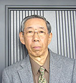代表 三津 輝雄