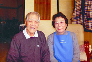 Tさんと共に、筆者の平岡さん